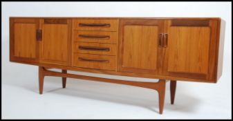 A reto 1970's G-Plan teak wood sideboard, with a b