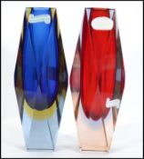 A pair of 20th century Murano Sommerso faceted Italian glass vases. Each of angled form with red and