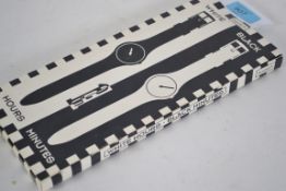 An original 1995 Swatch White & Black ( White Hours - Black Minutes ) pair of watches still in the