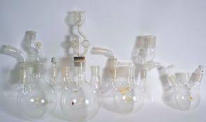 A collection of Industrial Laboratory equipment glass bottles - bulbous vials etc ( see