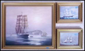 A collection of 3 maritime lacquered framed prints the larger of which depicts several tall ships in