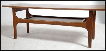 A retro 20th century G Plan style teak wood coffee