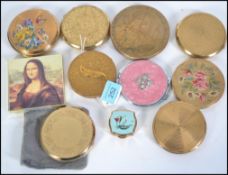 A collection of vintage mid 20th century ladies compacts to include Yardley, Stratton etc please see
