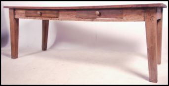 A large 19th / 20th  century French provincial cherry wood refectory dining table, planked