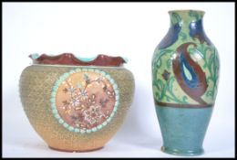 A late 19th early 20th century Doulton Slaters patent floral decorated gilt heightened jardiniere