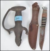 A 19th century ? cast metal sword hilt together wi