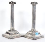 A pair of large silver hallmarked candlesticks by Hawksworth Eyre & Co Ltd, Birmingham 1912. The