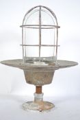 A vintage mid 20th century Industrial bulk head li