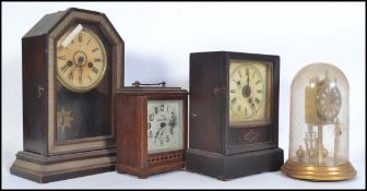 A collection of clocks to include a Victorian Junghans 8 day gingerbread clock, an anniversary clock