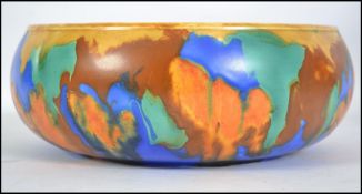 An Art Deco multi coloured drip glaze bowl. Stampe