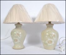 A near pair of 20th century Denby stoneware table lamps hand thrown by Alan Pickering both with