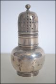 A Victorian silver hallmarked condiment - pepper pot. The pot hallmarked for  Pairpoint Bros -John &