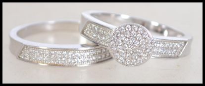 A contemporary 20th century silver cz adorned enga