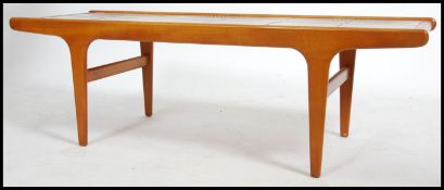 A retro Danish inspired 20th century low teak wood