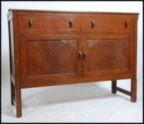 A 1940's oak utility furniture sideboard - circa m
