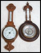 Two 20th century oak banjo barometers both A/F. Wi