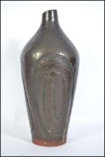 A large 20th century studio pottery vase of bulbou