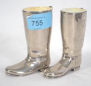 A pair of retro silver plated drinks measures in t