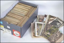 A good collection of approx 900 postcards, mostly early 20th century cards to include