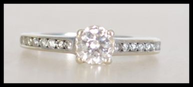 A hallmarked 9ct white gold diamond solitaire ring