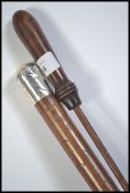 A silver topped swagger stick with notation OBP 41st Regt together with a 19th century rifle
