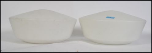 A pair of vintage earlier part of the 20th century milk glass ceiling light shades