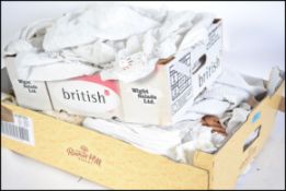 A collection of vintage linens/ clothing predomina