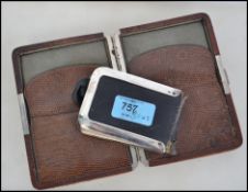A silver hallmarked banded leather note pad being marked for London ( weight 61.8g ) together with