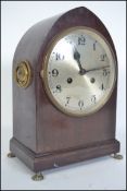 An Edwardian mahogany lancet shaped mantel clock w
