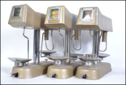 A group of three vintage Bank money weighing scales ( Omal Moneychecker ) ex Lloyd Bank. Together