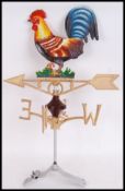 A large vintage style, 20th century cast iron cockerel weather vane. Measures 72cms tall.