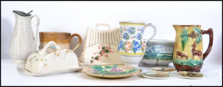 A collection of ceramics to include a Delft harvest jug, Staffordshire Cheese dishes, Victorian