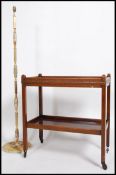 A vintage mid 20th century oak drinks / hostess two tiered trolley together with an Onyx standard