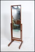 A mid century mahogany floor standing cheval mirro