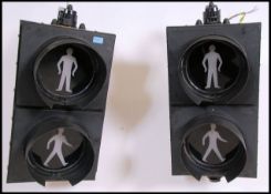 A pair of 20th century / modern LED Industrial traffic lights , the circular screes with hoods set