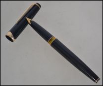 A vintage 20th century Montblanc Meisterstuck fountain pen No.14 having black resin body and gold