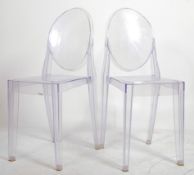 A pair of contemporary Victoria Ghost for Kartell clear transparent dining chairs ( ghost