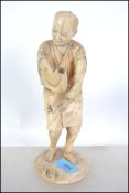 A 19th century Japanese Okimono ivory carved figur