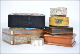 A vintage mother of pearl pill box having inset dr