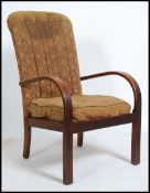 A 1950's mid century bentwood armchair being raise