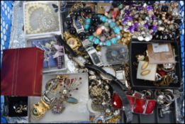 A collection of costume jewellery to include many items such as silver and white metal ladies rings,