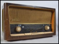 A vintage mid 20th century wooden cased Grundig va