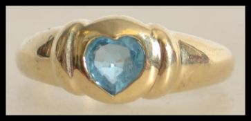 A 9ct Gold and Blue Topaz Ring