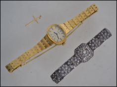 A 9ct gold hallmarked necklace pendant in the form of a cross together with a 925 silver marcasite