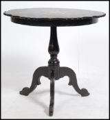 A Victorian 19th century papier mache tripod wine