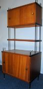 A 1970's Robex teak wood modular wall system cabinet having a series of teak shelves and cabinets of