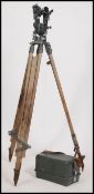 A good 20th century Industrial Theodolite complete in the original case and raised on a good large