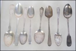 A collection of silver hallmarked teaspoons and a stilton shovel. 19th century examples to include
