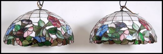 A pair of vintage 20th century Tiffany style leaded glass hanging ceiling light shades with