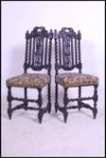 A pair of 19th century VIctorian oak Carolean revival barley twist dining chairs. The barley twist